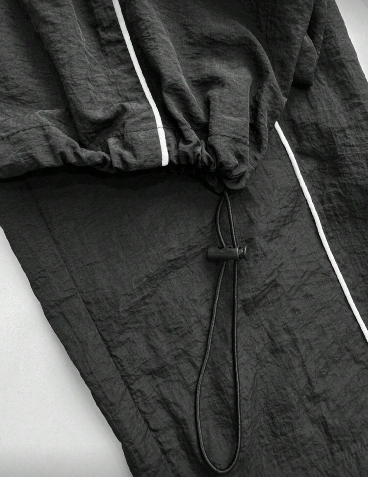 “Velocity Line” Track Pants